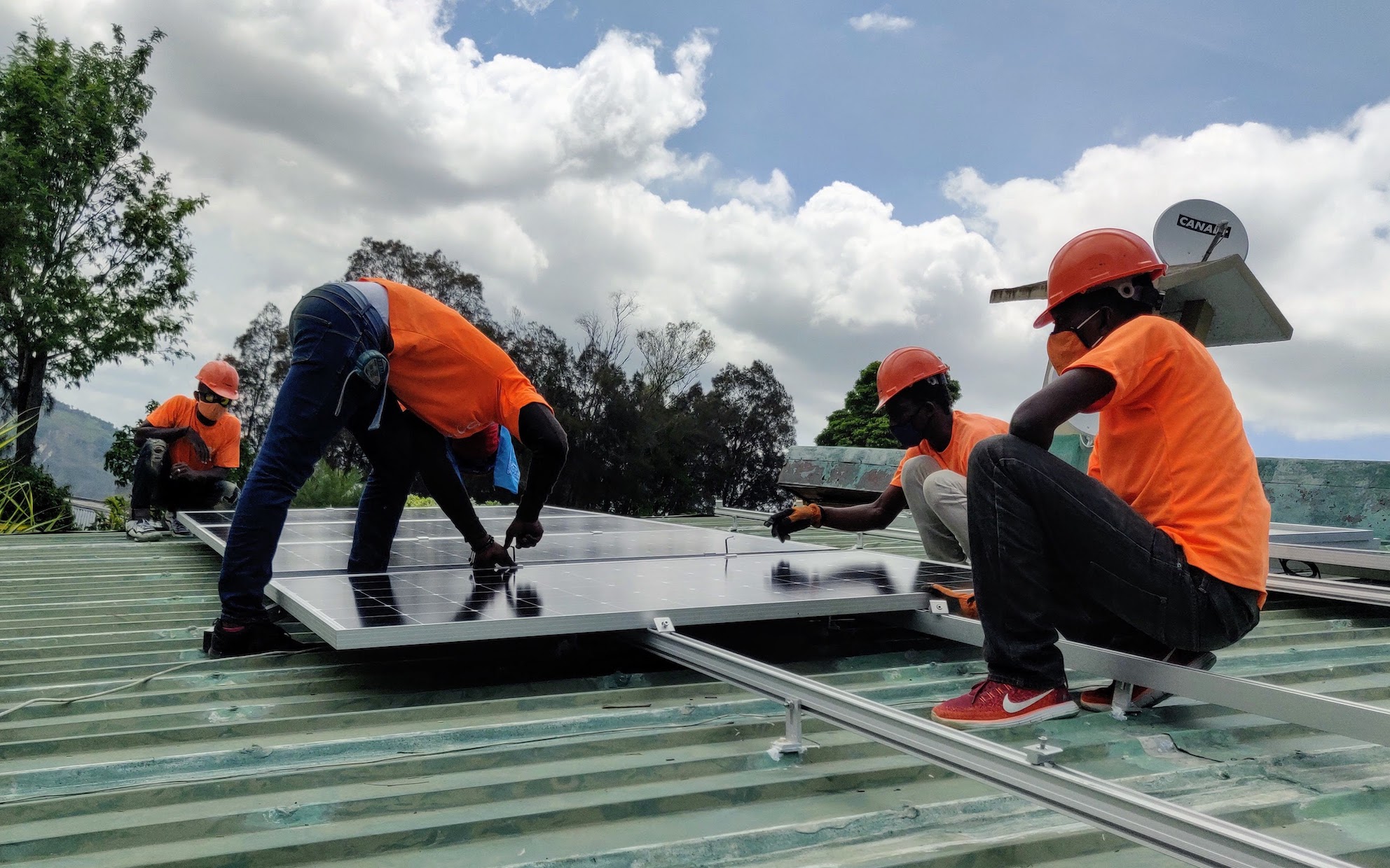 Solengy technicians installing solar panels