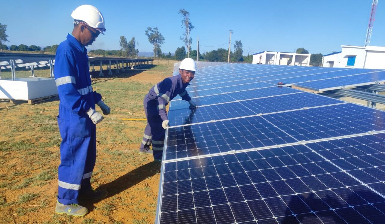 Solar technicians working on solar panels at ANKA site in Madagascar